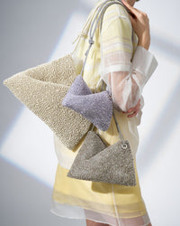 SS25_Main_2_TWIST_BAG_MINI_PB25FP63K9_LAVANDAGENTO_TWIST_BAG_SMALL_PB23SP64F5_KHAKIGENTO_TWIST_BAG_LARGE_PB23FP65B1_LATTE_OPACO_c73948b2-751d-41b5-9386-bfd1fcba626b